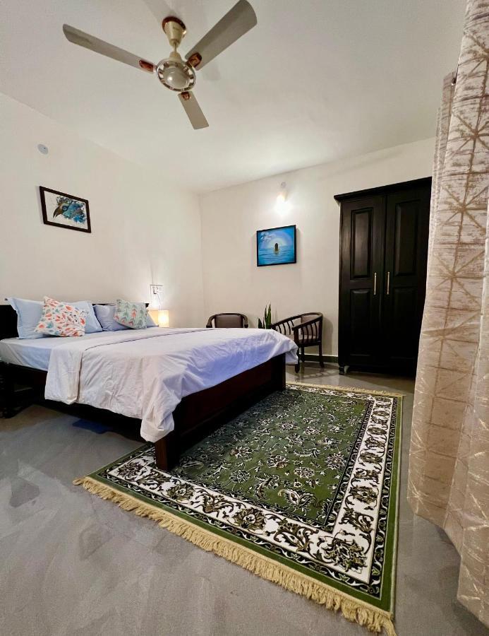 Green Castle Apartment Gonikoppal Bagian luar foto